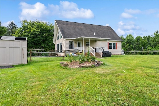 135 Preacher Rd, East Huntingdon, PA 15639 - back of property featuring a storage shed and a shingled roof