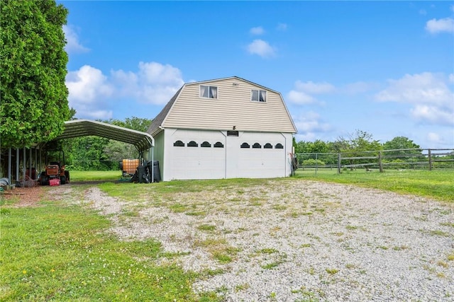 135 Preacher Rd, East Huntingdon, PA 15639 - garage featuring a carport