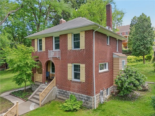 1571 Baldwick Rd, Banksville/Westwood, PA 15205 - view of front of house featuring a chimney, a front yard, and brick siding