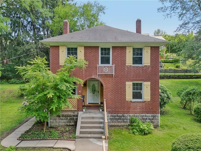 1571 Baldwick Rd, Banksville/Westwood, PA 15205 - colonial home featuring a chimney, brick siding, and a front yard