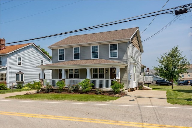 445/447 Georgetown Rd, Cecil, PA 15055 - view of front of property with covered porch, driveway, and a front lawn