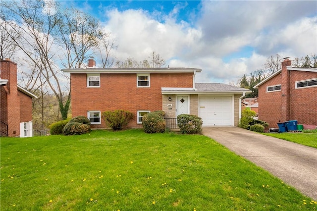 540 Lucia Dr, Wilkins Twp, PA 15221 - split level home with brick siding, a garage, concrete driveway, and a front lawn