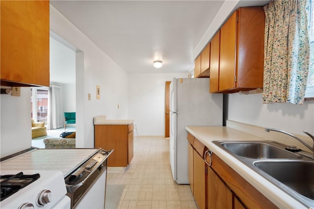 540 Lucia Dr, Wilkins Twp, PA 15221 - kitchen featuring brown cabinetry and light countertops
