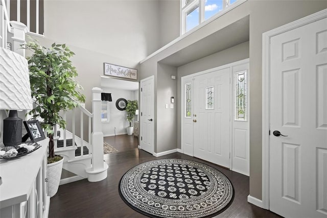 1008 Aspen Dr, Findlay Twp, PA 15126 - foyer entrance with a towering ceiling, dark wood-style flooring, and stairs