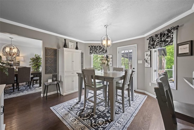 1008 Aspen Dr, Findlay Twp, PA 15126 - dining area with a chandelier, a textured ceiling, dark wood-type flooring, and ornamental molding