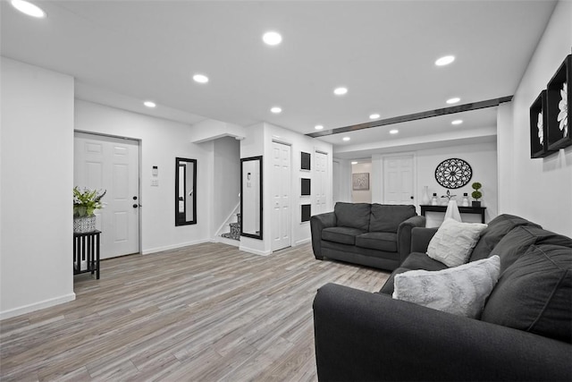 1008 Aspen Dr, Findlay Twp, PA 15126 - living area with light wood-style flooring, recessed lighting, and stairway