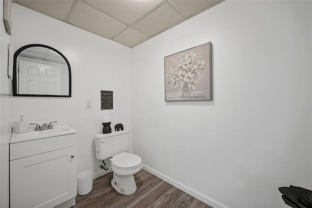 1008 Aspen Dr, Findlay Twp, PA 15126 - bathroom with wood finished floors, a drop ceiling, and vanity