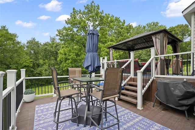 1008 Aspen Dr, Findlay Twp, PA 15126 - deck with a gazebo, a grill, outdoor dining area, and view of wooded area