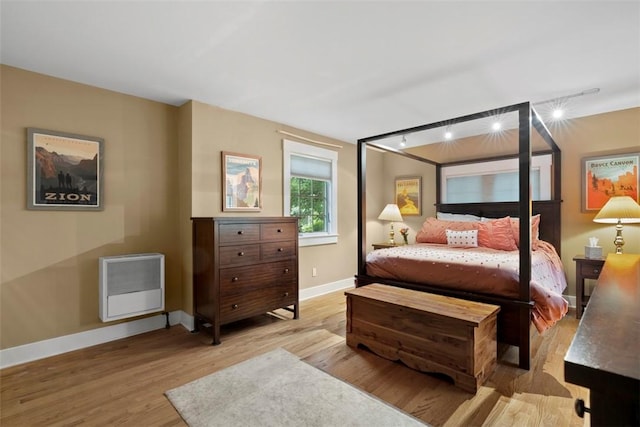 36 Warriors Rd, Green Tree, PA 15205 - bedroom featuring heating unit, rail lighting, and wood finished floors