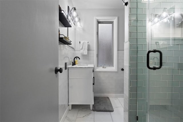 36 Warriors Rd, Green Tree, PA 15205 - bathroom featuring vanity, a stall shower, marble look tile flooring, and tile walls
