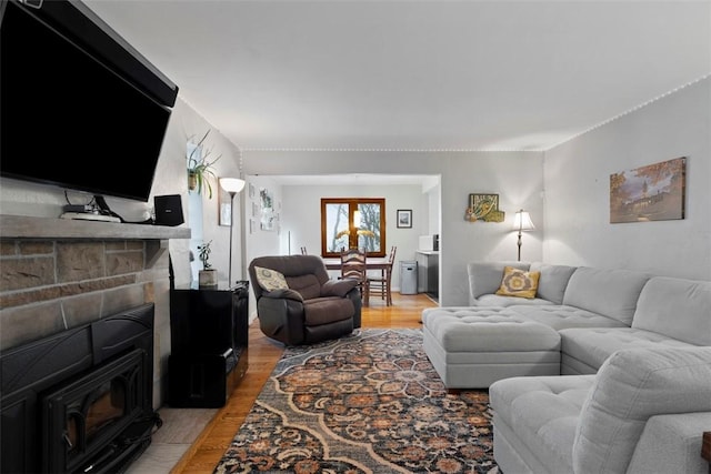 36 Warriors Rd, Green Tree, PA 15205 - living room featuring light wood finished floors and a wood stove