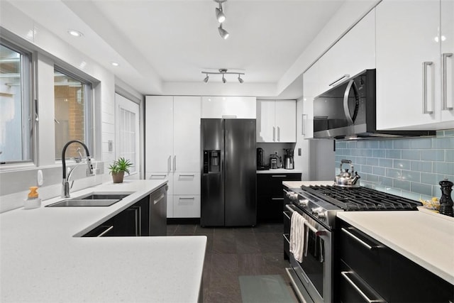 36 Warriors Rd, Green Tree, PA 15205 - kitchen featuring black appliances, light countertops, white cabinetry, and backsplash