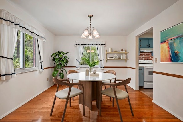 100 Laurel Hill Dr, Pine Twp Nal, PA 15090 - dining area with a chandelier and wood finished floors