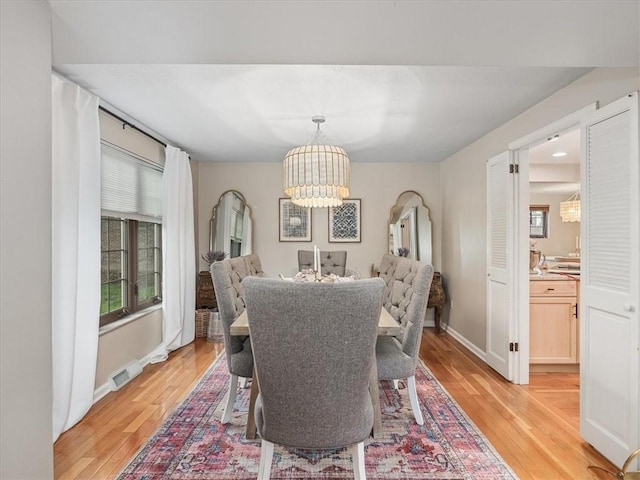 212 Timber Ln, Aleppo, PA 15143 - dining space with a chandelier and light wood-type flooring