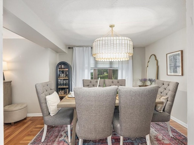 212 Timber Ln, Aleppo, PA 15143 - dining area featuring a chandelier and wood finished floors