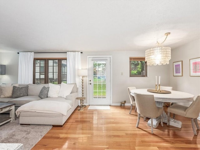 212 Timber Ln, Aleppo Nal, PA 15143 - living area featuring light wood-style flooring and a chandelier