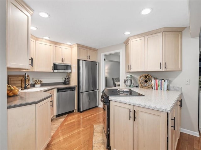 212 Timber Ln, Aleppo Nal, PA 15143 - kitchen featuring stainless steel appliances, light brown cabinetry, light wood-type flooring, recessed lighting, and light countertops