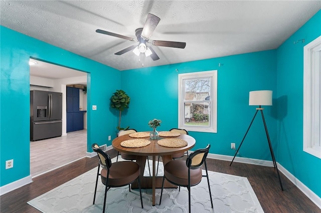 624 S Darby Rd, Hermitage, PA 16148 - dining space featuring wood finished floors, a ceiling fan, and a textured ceiling