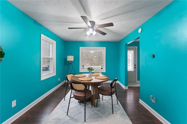 624 S Darby Rd, Hermitage, PA 16148 - dining space featuring ceiling fan, a textured ceiling, and dark wood-type flooring
