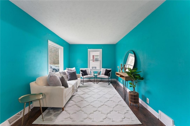 624 S Darby Rd, Hermitage, PA 16148 - living room with a textured ceiling and wood finished floors
