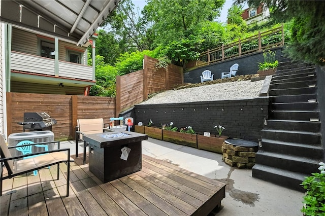 2740 Shelly St, South Side, PA 15203 - wooden deck featuring stairs, an outdoor fire pit, area for grilling, and a patio area