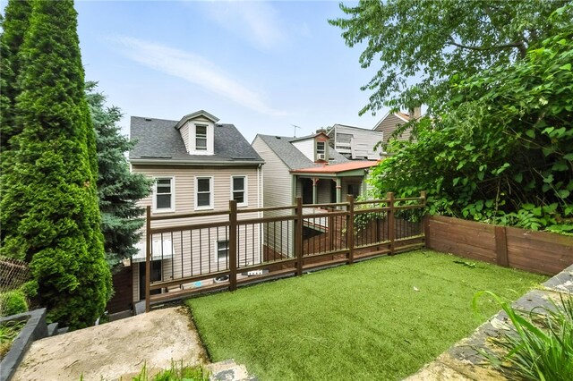 2740 Shelly St, South Side, PA 15203 - back of house featuring a fenced backyard and roof with shingles
