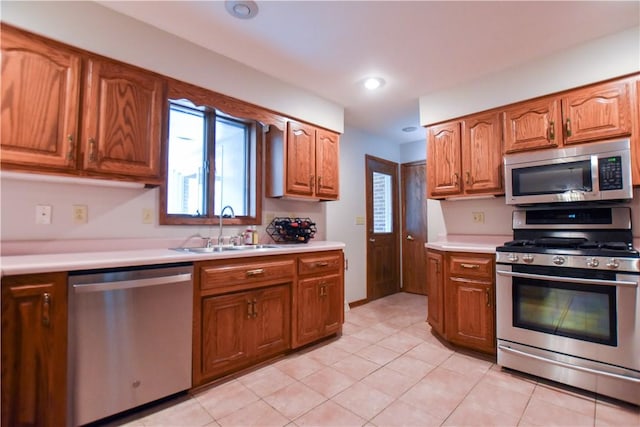 150 Morgan Rd, Penn Twp But, PA 16002 - kitchen featuring stainless steel appliances, light countertops, brown cabinets, and recessed lighting