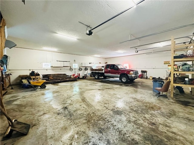 150 Morgan Rd, Penn Twp But, PA 16002 - garage featuring a garage door opener