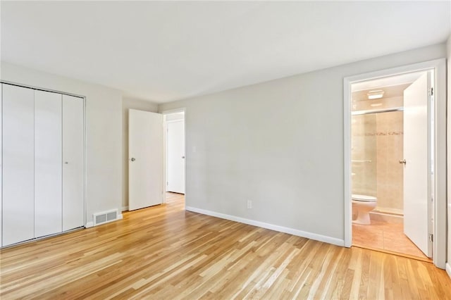 1154 Bucknell, Monroeville, PA 15146 - unfurnished bedroom with light wood-type flooring, ensuite bath, and a closet