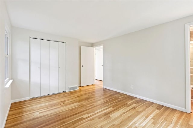 1154 Bucknell, Monroeville, PA 15146 - unfurnished bedroom featuring light wood-type flooring, a closet, and ensuite bathroom