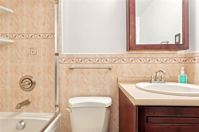 1154 Bucknell, Monroeville, PA 15146 - bathroom with vanity, washtub / shower combination, tile walls, and wainscoting