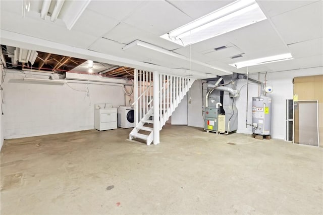 1154 Bucknell, Monroeville, PA 15146 - unfinished below grade area with water heater, washing machine and clothes dryer, heating unit, and stairway