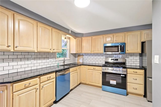 1154 Bucknell, Monroeville, PA 15146 - kitchen with stainless steel appliances, light brown cabinets, and tasteful backsplash