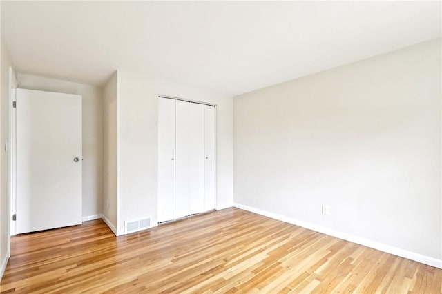 1154 Bucknell, Monroeville, PA 15146 - unfurnished bedroom featuring light wood-style flooring and a closet