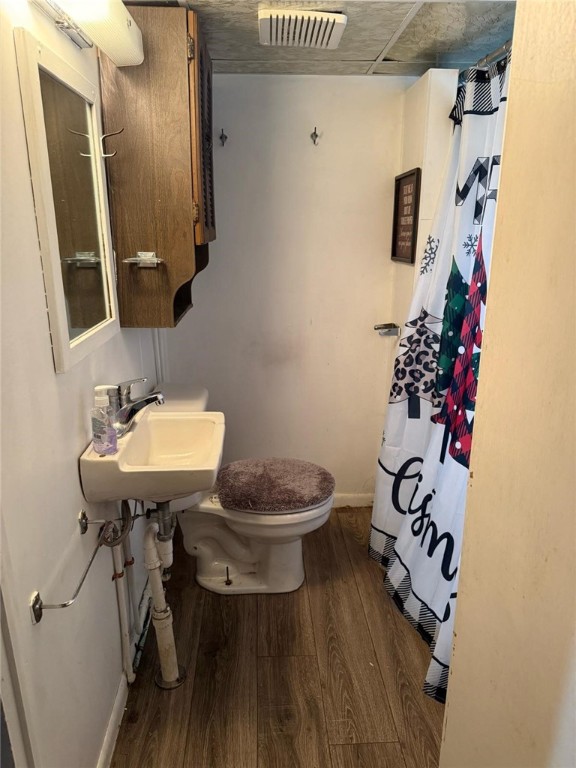 1930 Morris St, Shenango Twp Law, PA 16102 - bathroom with wood finished floors and a shower with curtain
