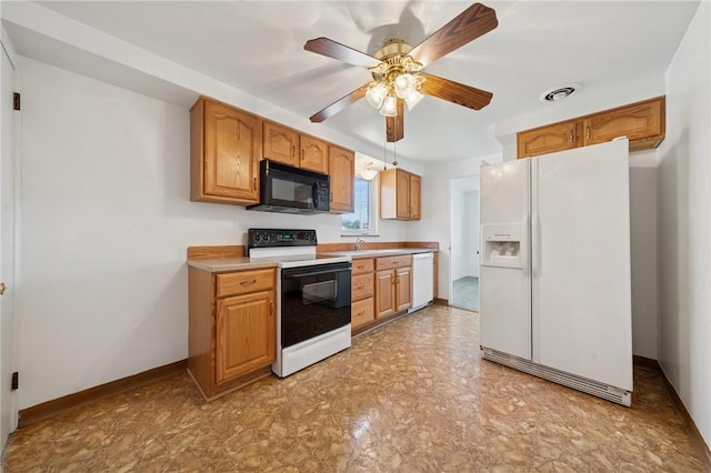 520 Judith Dr, Baldwin Boro, PA 15236 - kitchen with white appliances, light countertops, ceiling fan, brown cabinetry, and light flooring