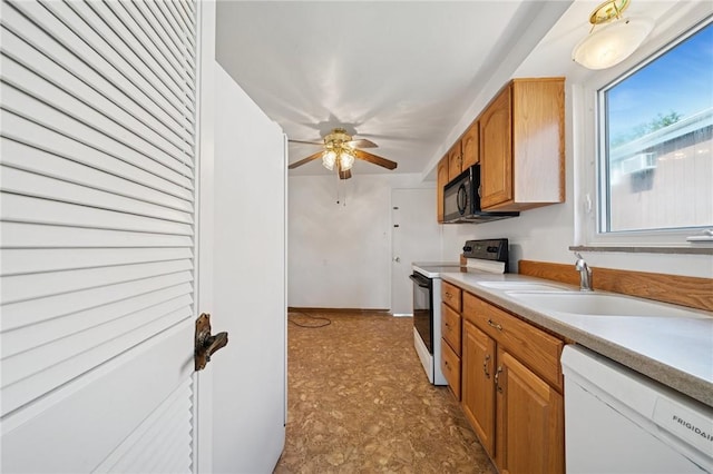 520 Judith Dr, Baldwin Boro, PA 15236 - kitchen featuring range with electric cooktop, dishwasher, black microwave, light countertops, and a ceiling fan