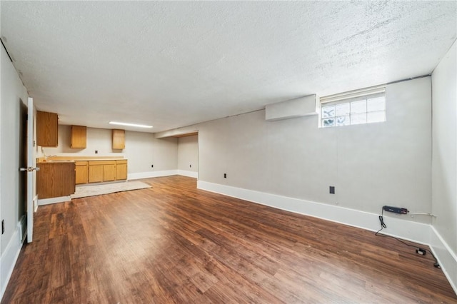 520 Judith Dr, Baldwin Boro, PA 15236 - unfurnished living room featuring dark wood-style floors and a textured ceiling