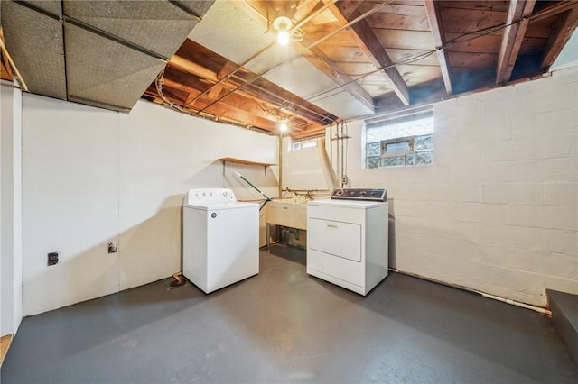 520 Judith Dr, Baldwin Boro, PA 15236 - below grade area featuring independent washer and dryer and concrete block wall