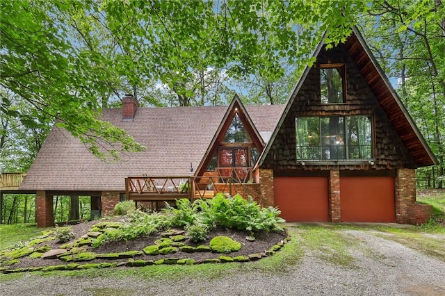 890 Pearce Mill Rd, Pine Twp Nal, PA 15090 - a-frame home featuring driveway, brick siding, a chimney, and a deck
