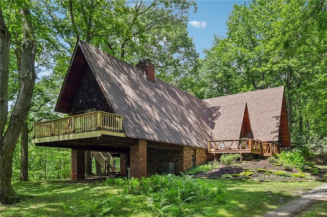 890 Pearce Mill Rd, Pine Twp Nal, PA 15090 - view of side of property with a wooden deck, a chimney, roof with shingles, brick siding, and a yard