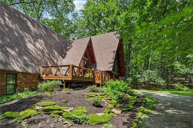 890 Pearce Mill Rd, Pine Twp Nal, PA 15090 - view of home's exterior featuring a deck and brick siding