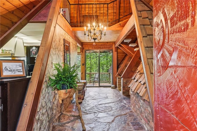 890 Pearce Mill Rd, Pine Twp Nal, PA 15090 - foyer entrance featuring a chandelier and stone floors