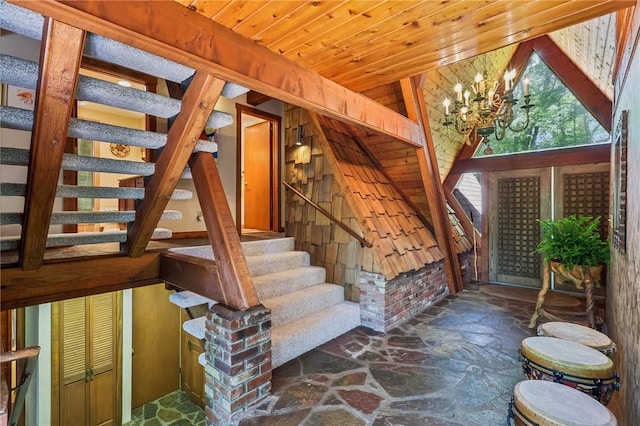 890 Pearce Mill Rd, Pine Twp Nal, PA 15090 - stairs with stone flooring, a chandelier, and wood ceiling