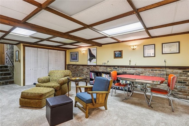 890 Pearce Mill Rd, Pine Twp Nal, PA 15090 - living room featuring coffered ceiling, brick wall, carpet floors, stairway, and wainscoting