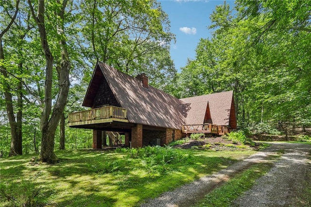 890 Pearce Mill Rd, Pine Twp Nal, PA 15090 - view of home's exterior with a wooden deck, a chimney, and roof with shingles