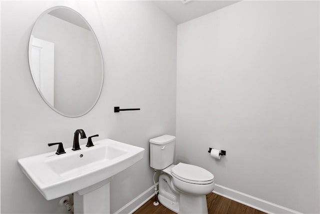 107 Abigail Dr, Adams Twp, PA 16046 - bathroom featuring baseboards and wood finished floors