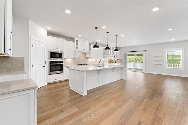 107 Abigail Dr, Adams Twp, PA 16046 - kitchen with appliances with stainless steel finishes, tasteful backsplash, white cabinetry, and recessed lighting