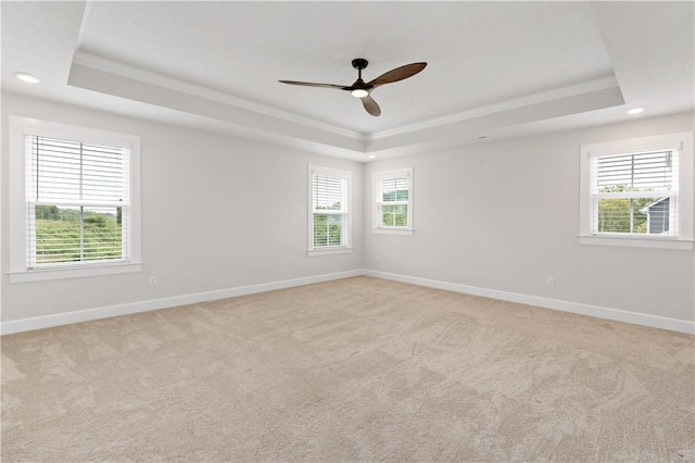 107 Abigail Dr, Adams Twp, PA 16046 - empty room featuring a tray ceiling, ceiling fan, recessed lighting, light colored carpet, and ornamental molding