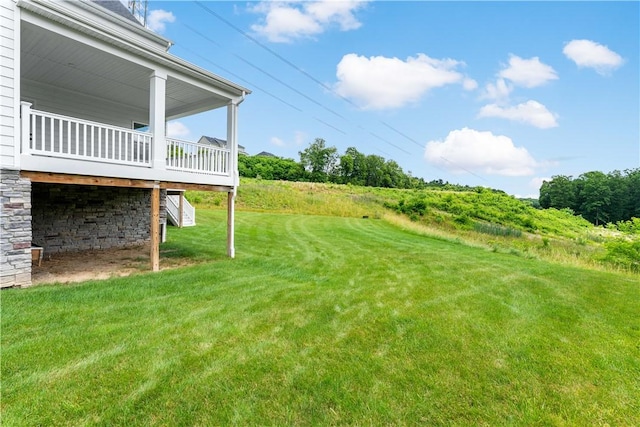 107 Abigail Dr, Adams Twp, PA 16046 - view of green lawn featuring a wooden deck and stairway